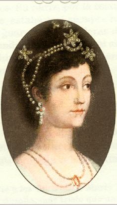 an old photo of a woman with pearls in her hair and wearing a tiara