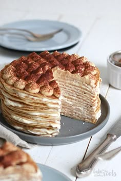 a stack of pancakes sitting on top of a plate