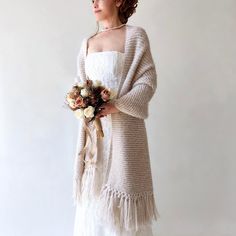 Wrap yourself in elegance with the handcrafted rectangular light beige shawl, perfect for your winter wedding or evening gatherings. Its versatile champagne cover up design complements any attire while keeping you cozy and shielding you from the cold during the fall, winter, and spring months. Moreover, these beige bone wrap make an excellent bridesmaid gift. MATERİAL:  Very soft, fuzzy and warm yarn. it is not itchy at all. 10% mohair, 10% wool, 80% premium acrylic-Polyamid MEASUREMENTS (Average): Length: 71'' (180cm) Width: 22'' (55cm) (without fringes) ❤ COLOR: 19. Light Beige as shown. ❤ AVAİLABLE COLORS:   (See last picture) 1. White 2. Ivory 3. Champagne (Rose) 4. Light Pink (Powder) 5. Pale Violet Red(Rose) 6. Hot Pink (Fushsia) 7. Lilac-Lavander (Periwinkle) 8. Purple-Violet (Light Beige Bohemian Shawl For Wedding, January Wedding Scarves & Shawls, Hand Knitted Beige Winter Shawl, Country Winter Wedding Scarves & Shawls, Beige Fur Shawl, Winter Wrap, Spring Months, Beige Wedding, Wool Wrap