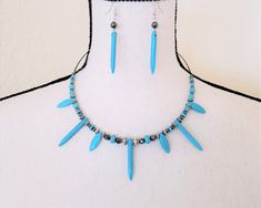 "This is a Howlite Hematite, Jewelry set, Necklace earrings, Healing necklace, Howlite necklace, hematite energy, Gemstone jewelry, gift idea. ◆This item is set of the earrings and necklace◆ -Earrings- The detail of the beads are Howlite horn stick 38mm x2 Hematite round 6mm x2. Length : 64mm (2-1/2\") Weight : 2g (0.05oz) x2 --------------------- *Option Silver* We can change the parts of earrings to sterling silver with an additional charge. The interchangeable parts are only hook of the earrings with stamp of the sterling silver 925 -Choker necklace- The detail of the beads are Howlite horn stick 38mm x3,  Howlite marquise 22mm 3, Howlite rondelle 5mmx8mm x2 Howlite rondelle 6mm x4, Howlite round 6mm x6, 4mm x4, Hematite round 6mm x5, facet round 6mm x4, Hematite facet round 4mm x4, rou Hematite Jewelry, Howlite Necklace, Healing Necklace, Earrings And Necklace, Set Necklace, Metal Earrings, Necklace Earrings, Stone Beads, Round Beads