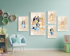 three cartoon dogs hanging on the wall in a child's room with blue walls