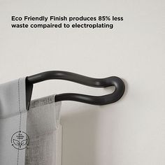 an image of a curtain hanging on the side of a wall with text that reads eco friendly finish produces 85 % less waste compared compared compared to electroplating