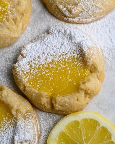 lemon cookies with powdered sugar on top