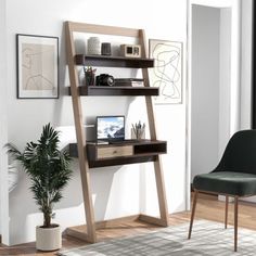 a living room with a ladder leaning up against the wall next to a desk and chair