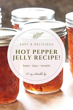 several jars filled with jelly sitting on top of a wooden table in front of a sign that says, easy and delicious hot pepper jelly recipe