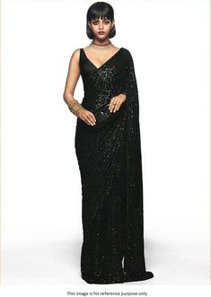 Bollywood replica SareeBollywood Sabyasachi Inspired black georgette saree with sequins and multi work,lace border work.Blouse in satin unstiched.Shipping time 5-7 daysBuy this Saree at Kollybollyethnics and make your occasion very special !!. With Express Free Shipping and Custom Stitching, Shop Bollywood Sabyasachi Inspired black georgette sequin saree online at kollybollyethnics from India with free worldwide shipping. Sequin Blouse Saree, Black Sequence Blouse, Black Sequin Saree, Glitter Saree, Sequin Saree Blouse, Sabyasachi Saree, Sequins Saree, Saree For Wedding Function, Sabyasachi Sarees