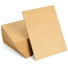 several pieces of cardboard stacked on top of each other with one piece cut out to show the bottom