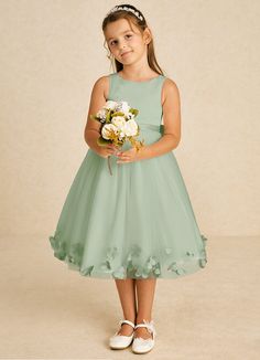 Dot features a charming A-line design crafted from a delightful mix of matte satin and tulle. Its scoop neckline and sleeveless style are complemented by a convenient zipper closure and whimsical bows, creating a playful yet elegant look for any special event. Sage Flower Girl Dress, Green Flower Girl Dresses, Tea Length Flower Girl Dress, Tea Length Tulle, Dusty Sage, Sage Dress, Military Ball Dresses, Special Event Dresses, Lace Bride