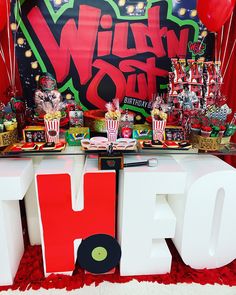 an image of a birthday party with balloons and presents on the table for someone's 30th birthday