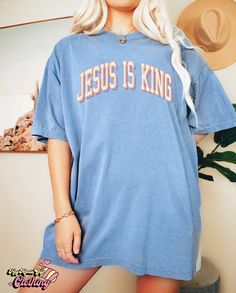 Product details: ✔️ NAME: Jesus Is King T-Shirt, Jesus Shirt, Christian Shirt, Faith Based Shirt, Bible Verse Shirt, Love Like Jesus Shirt, Worship Shirt, Faith Shirt ✔️ IMPORTANT NOTE: Both Men and Women can we our shirts because this is unisex style t-shirts; Wash item inside out in cold water, do not bleach, do not dry clean, do not iron directly on the design. ✔️ MATERIAL: 5.3-ounce, 100% cotton (99/1 cotton/poly (Ash) & 90/10 cotton/poly (Sport Grey); Heavyweight classic unisex tee; Taped neck and shoulders; Tearaway label; Decoration type: Digital Print ✔️ OUR DESIGN PRODUCTS: Each One are designed and sold in limited quantities. The designs are created by our incredibly talented in house graphic art team who often hand draw and illustrate each Tee shirt design. ✔️ SIZE CHART: Please Blue Relaxed Fit Tops With Lettering, Relaxed Fit Short Sleeve Shirt With Lettering, Blue Short Sleeve Tops With Lettering, Heavenly Fashion, Alabama T Shirts, Chosen Shirt, Christian Crewneck, Jesus Clothes, Christian Shirts Designs