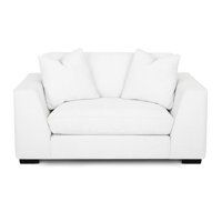 a white couch with pillows on it