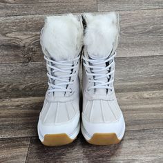 The Ugg Women's Adirondack Iii Fluff Boots Are Made From Fur, Genuine Leather, Nylon, Polyester, And Rubber. They Are Waterproof And Have A Lace-Up Closure. No Box Comfortable Chic Faux Fur Keeps Feet Warm Like New Condition. Refer To All Picture's Before Purchase. Questions? Leave Comments Below. Thank You For Visiting Comfortable Chic, Waterproof Boots, Womens Uggs, Ugg Shoes, Gray White, Rain Boots, Faux Fur, Genuine Leather, Size 7