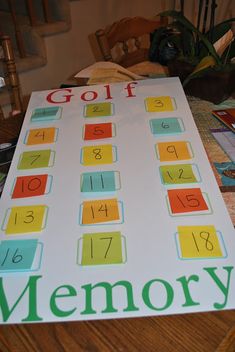 a golf memory board sitting on top of a table