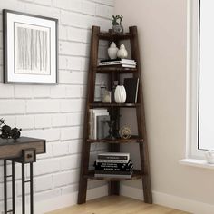 a tall wooden shelf with books on it