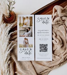 the save the date cards are laying on top of a blanket next to a plant