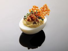 an egg with some kind of food on it