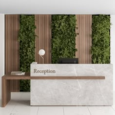 the reception desk is covered with green plants and has a white marble counter top that reads reception