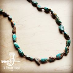 Chunky Beaded Necklace features genuine Natural Turquoise stones. Due to the nature of the stones, they will vary in size and color, as pictured. Mix and match from pieces of the same collection to create your own look. Entire length of necklace is 32 inches, plus the extender chain The necklace can be adjusted with the self-tie closure Beads will range in size from 12-20mm Although your item will resemble the photo, each piece is created by hand, so no two are identical.Thank you for visiting T Adjustable Beaded Rustic Turquoise Necklace, Adjustable Turquoise Beaded Amazonite Necklaces, Artisan Turquoise Amazonite Jewelry, Handmade Bohemian Turquoise Necklace With Oval Beads, Artisan Beaded Amazonite Jewelry, Artisan Amazonite Beaded Jewelry, Adjustable Jasper Jewelry In Turquoise, Turquoise Jewelry With Round Natural Stone Beads, Rustic Adjustable Turquoise Beaded Necklaces