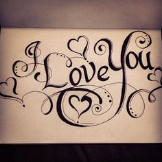 the word i love you written in cursive writing on a piece of paper