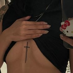 I got Sternum dagger... Choose pictures of Taylor Swift and I'll give you a tattoo to get Women Grunge Tattoo, Traditional Tattoo Sternum, Tattoo Ideas Female Patchwork, Bold Tattoos For Women, Tattoo Ideas Female Sternum, Women Tattoo Ideas Unique, Back Tattoo Inspiration, Women Hand Tattoos, Cover Up Tattoo Ideas Female