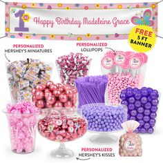 the birthday cake is decorated with pink and purple candies