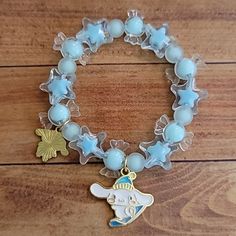 - Color: Baby Blue - Cinnamoroll Charms - Star And Candy Wrapper - Elastic - New In Package - Resin Material Blue Cinnamoroll, Candy Wrapper, Star Candy, Kids Accessories Jewelry, Candy Wrappers, Elastic Bracelet, Boutique Accessories, Resin Beads, Resin Material