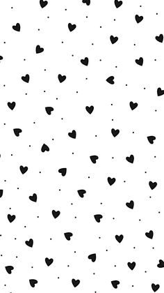 a black and white pattern with hearts on it