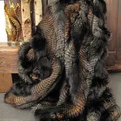 "The Black Pheasant faux fur throw is a new design to our collection. It is a thick faux-fur, mainly black with the addition of brown and black to create a 'feathery' type pattern. As with all of the fur throws we produce, almost any size can be made; although we list some of the 9 more popular sizes. This fur is quite heavy in the larger fur throw sizes. And of course, if you still can't find the size that you want please contact us and we will be happy to talk it through with you; remember, we Fur Aesthetic, Throw For Bed, Rustic Bedroom Design, Blanket Throws, Faux Fur Throw Blanket, Animal Fur, Faux Fur Blanket, Fur Throw Blanket, Brown Pillows