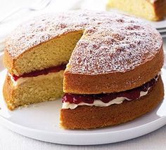 a cake that has been cut in half on a plate