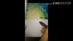 someone is drawing something with colored pencils on paper and it looks like they are going to paint