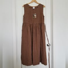 S/M Sized Smock Dress From Son De Flor In Brown Tartan. Dress Was Customized To Add Ties At The Waist, So The Dress Did Cost More Than Typical. Dress Is New With Tags, Never Worn. Perfect Condition! Funky Fits, Brown Tartan, Sack Dress, Harry Potter Fanfiction, Magical Garden, Tartan Dress, Vest Coat, Outfits 2023, Tie Colors