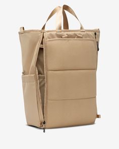 a beige tote bag with two pockets