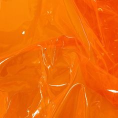 an orange plastic bag that looks like it could be used as a background or wallpaper