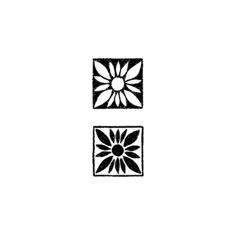 two black and white squares that have flowers on them, one has a flower in the middle