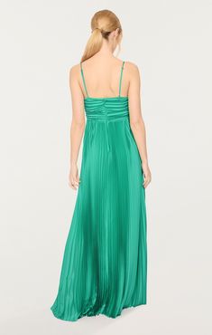 Experience the indulgent touch of Baltic Sea pleated satin with our Asra Gown. Embrace the graceful tea length and sleeveless style for a sophisticated and alluring appearance. Fit Details V necklineLinedFit and flareMaxiSleeveless97% Polyester 3% ElastaneDry Clean Only Imported Length: 56in/142.24cm, from strap baseMeasurements from size 4 Package Delivery, Fit Details, Baltic Sea, Tea Length, Price Match, Size 4, Satin, Tea, Dresses