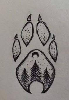 a drawing of a bear's paw with trees on it