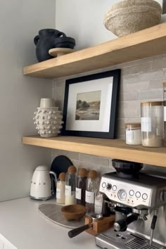 an espresso machine sitting on top of a counter