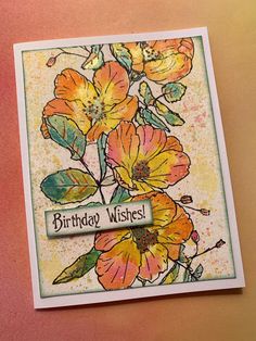 a birthday card with flowers on it and the words happy birthday wishes written in front