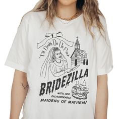 a woman wearing a white t - shirt with the words bridallla on it