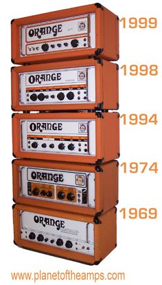 four orange amps stacked on top of each other