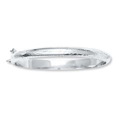 This bangle bracelet for children is styled in sterling silver and features a flat back. The polished bracelet has a snap-lock clasp and is lightweight for comfort. Simple Silver Jewelry, Jewelry Advice, Silver Bangle Bracelet, Sterling Silver Bangle Bracelets, Silver Jewelry Necklace, Sterling Silver Bangle, Kay Jewelers, Silver Jewels, Silver Jewelry Rings