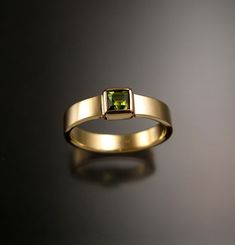 "4mm square Peridot is bezel-set in 14k Yellow Gold. 4mm wide by 1.5mm thick smooth comfortable band. Specify your ring size in a \"note to seller\" at check-out" Mens Gemstone Rings Unique, Peridot Ring Gold, Stone Rings For Men, Stone Ring Design, Mens Gemstone Rings, Green Tourmaline Ring, Light Jewelry, Single Stone Ring