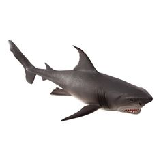 a toy shark with its mouth open on a white background