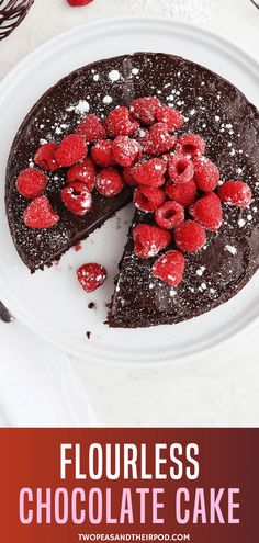 a chocolate cake with raspberries on top and the words flourless chocolate cake above it