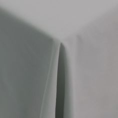 a plain white table cloth is folded over