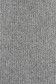 an up close shot of a gray carpet