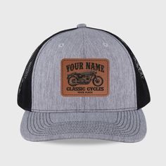 Hit the open road wearing a custom Hot Rod Garage trucker hat. You will be accelerating with class in this car-inspired design. Six panels - canvas front panels, mesh back panels Laser engraved Faux-Leather Patch Plastic snap closure for easy size adjustments Structured with a Pro High Crown Profile, slightly pre-curved visor Biker Cap For Outdoor Use, Biker Cap For Outdoor, Adjustable Cap For Biker Events, Biker Style Cap For Outdoor, Outdoor Biker Cap, Adjustable Black Motorcycle Hat, Custom Outdoor Baseball Cap With Flat Bill, Custom Cycles, Leather Patches