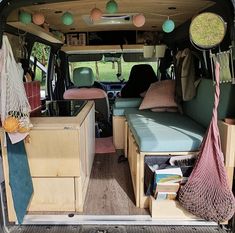 the interior of a van with several items in it and storage compartments on the side