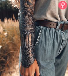 a man with a tattoo on his arm