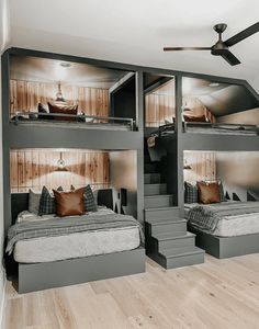 a bedroom with bunk beds and stairs leading to the upper floor, while another bed is on the second floor